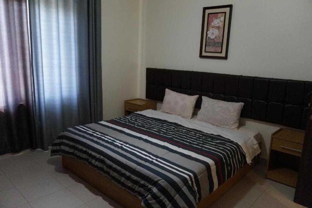 Postel nebo postele na pokoji v ubytování Samarah Resort D44