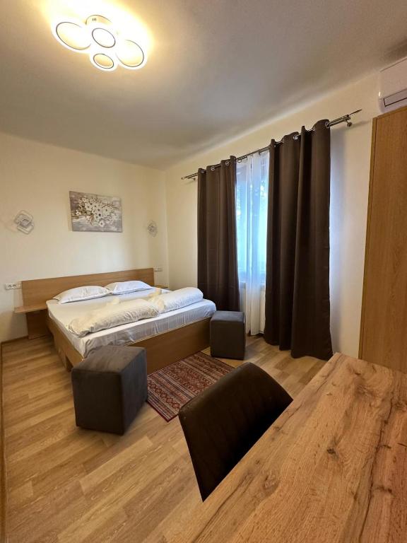 Postel nebo postele na pokoji v ubytování DorTin