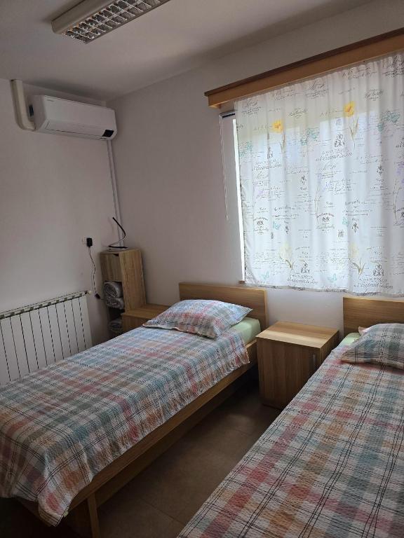 Postel nebo postele na pokoji v ubytování Guest house Kočanija