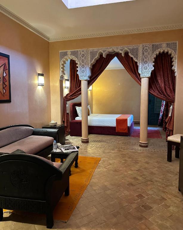 Postel nebo postele na pokoji v ubytování Palais Riad Berbère