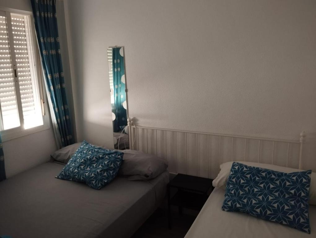 Postel nebo postele na pokoji v ubytování Piso Conil de la Frontera