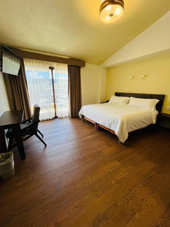 Postel nebo postele na pokoji v ubytování Hotel Casa Rubio
