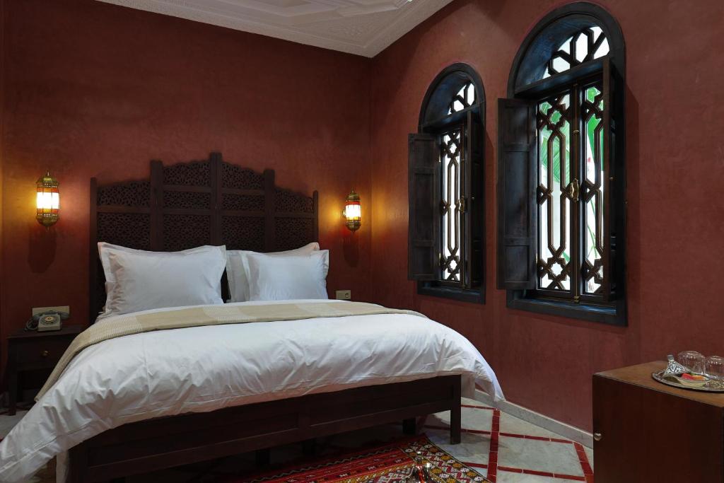 Postel nebo postele na pokoji v ubytování Alrashid Marrakech