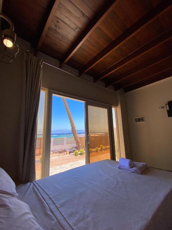 Postel nebo postele na pokoji v ubytování Balance Lodges