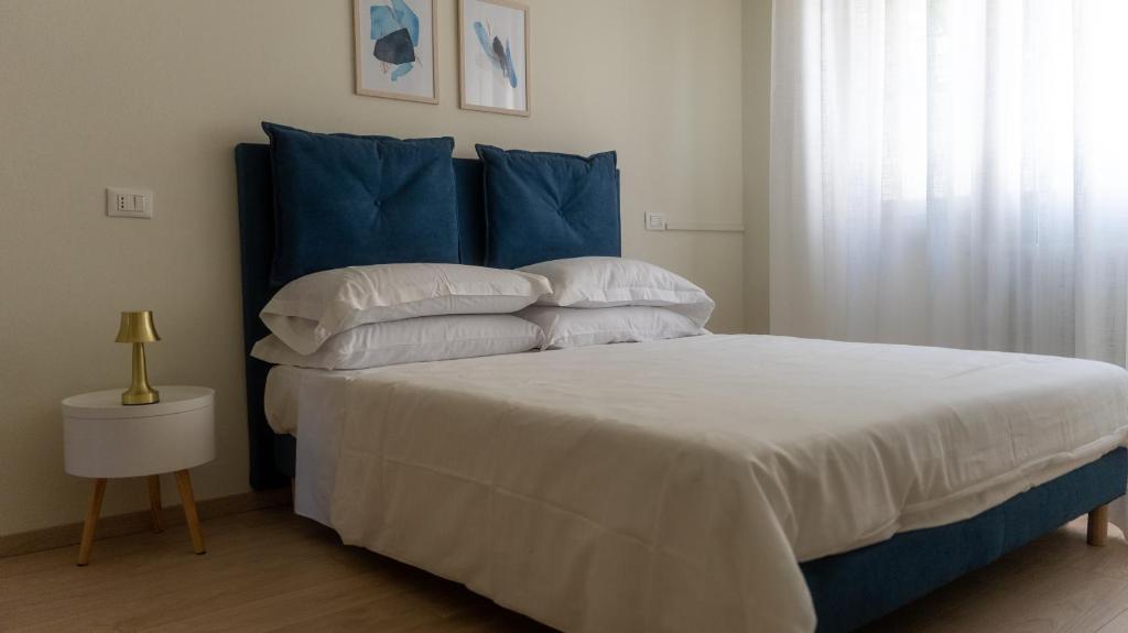 Posteľ alebo postele v izbe v ubytovaní Hotel Eden