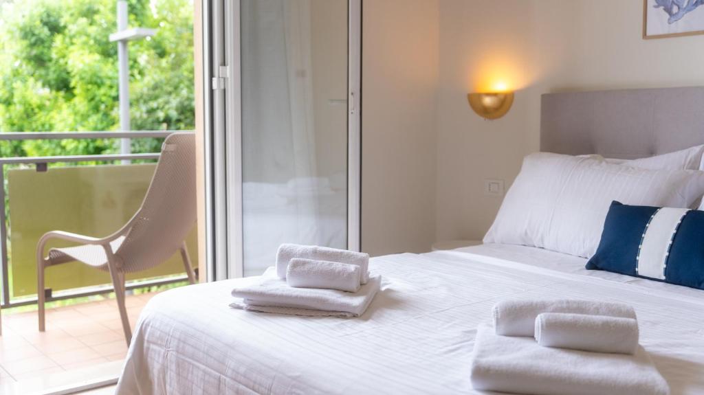 Posteľ alebo postele v izbe v ubytovaní Hotel Eden