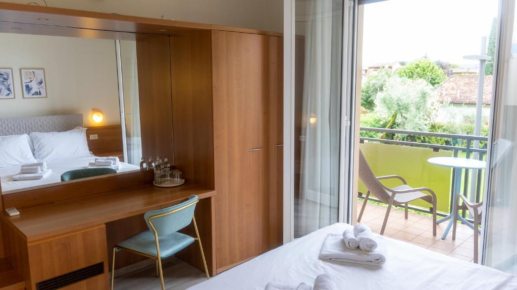 Posteľ alebo postele v izbe v ubytovaní Hotel Eden