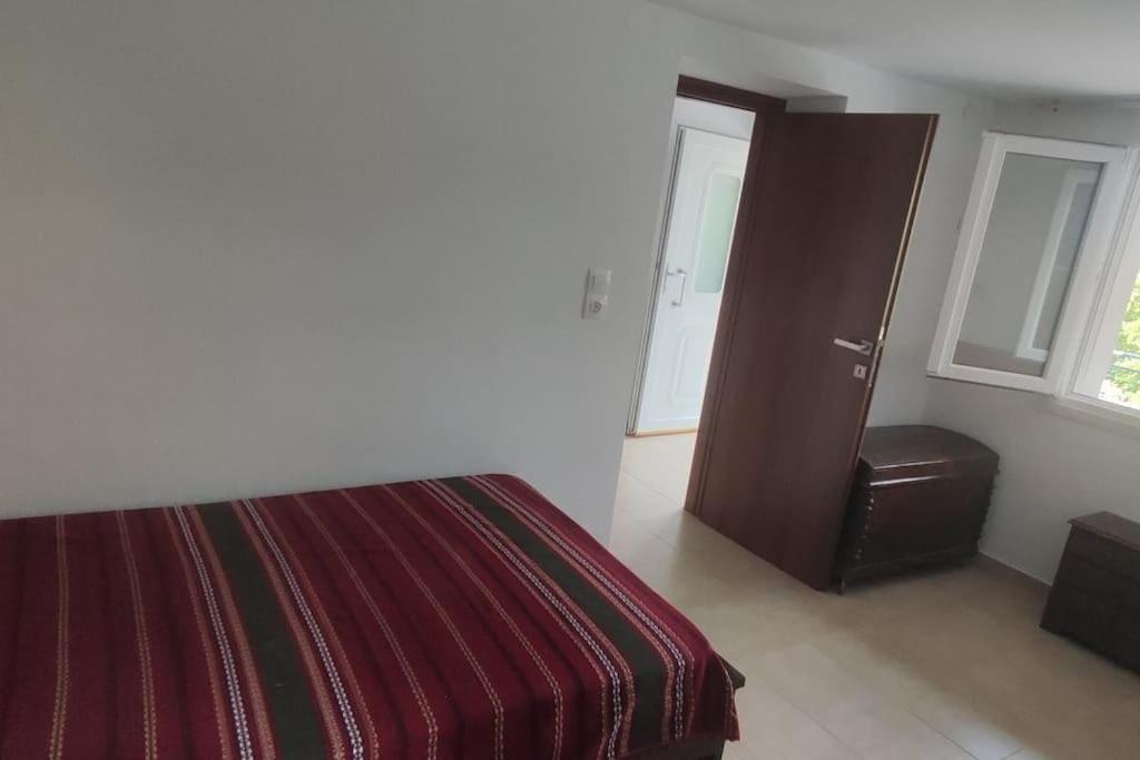 Postel nebo postele na pokoji v ubytování Rahati in Pramanta - Ραχάτι στου Τσακτσίρα