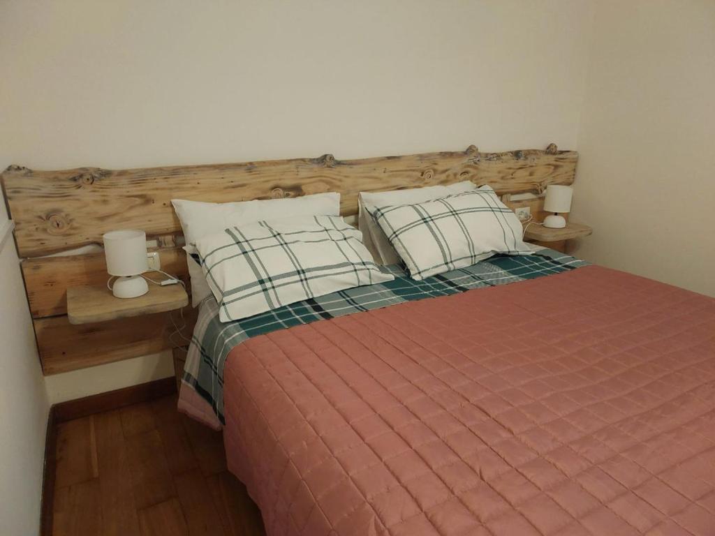 Postel nebo postele na pokoji v ubytování Nido Romantico