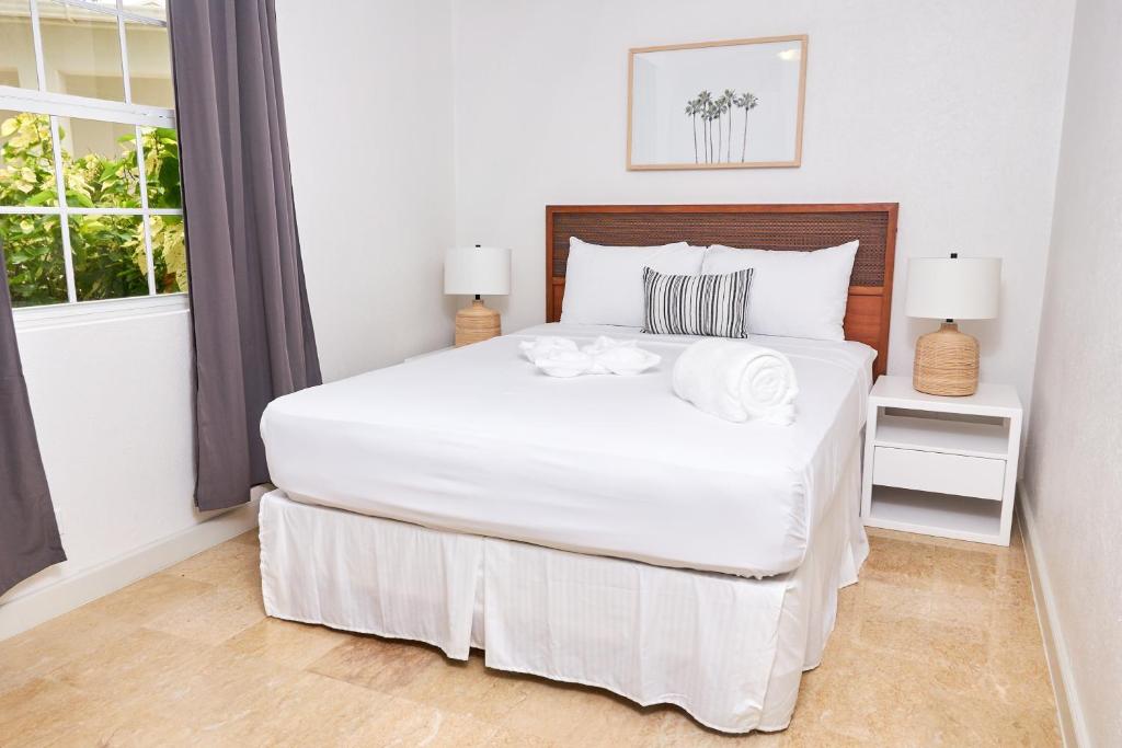 Postel nebo postele na pokoji v ubytování South Point Hotel Inc