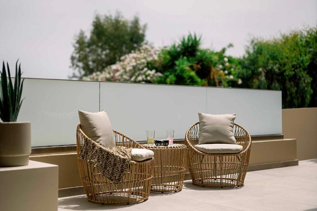 Χώρος καθιστικού στο Icarus & Hermes Luxury Apartments