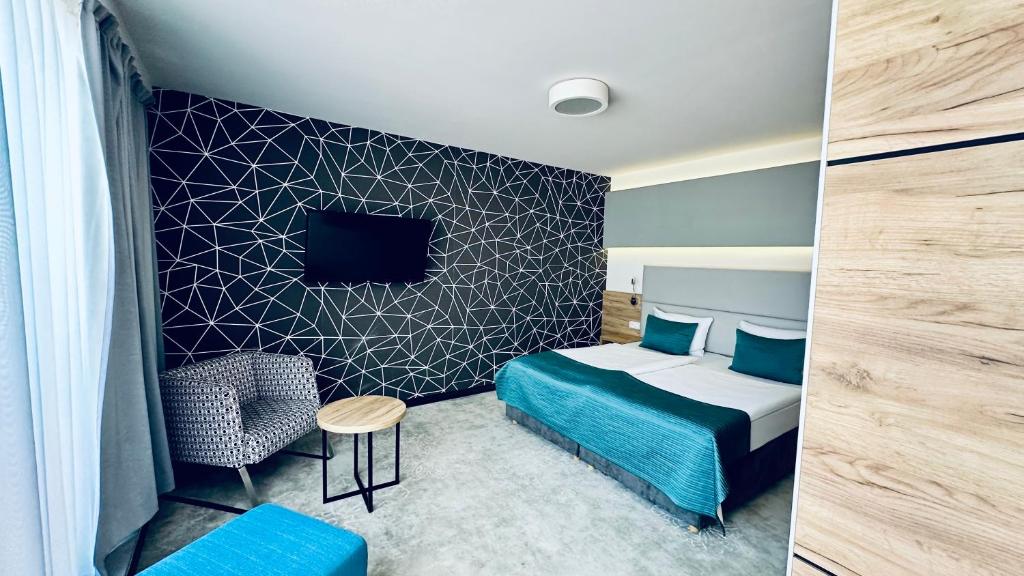 TV a/nebo společenská místnost v ubytování Hotel Limanova