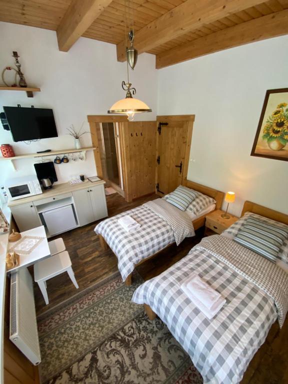 Postel nebo postele na pokoji v ubytování Apartmany Moravienka