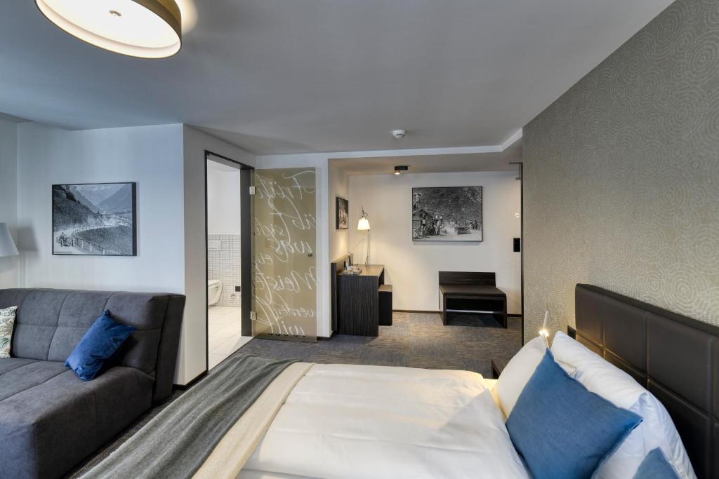 Postel nebo postele na pokoji v ubytování Boutique Hotel Reiser