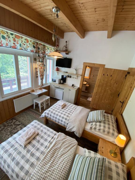 Postel nebo postele na pokoji v ubytování Apartmany Moravienka
