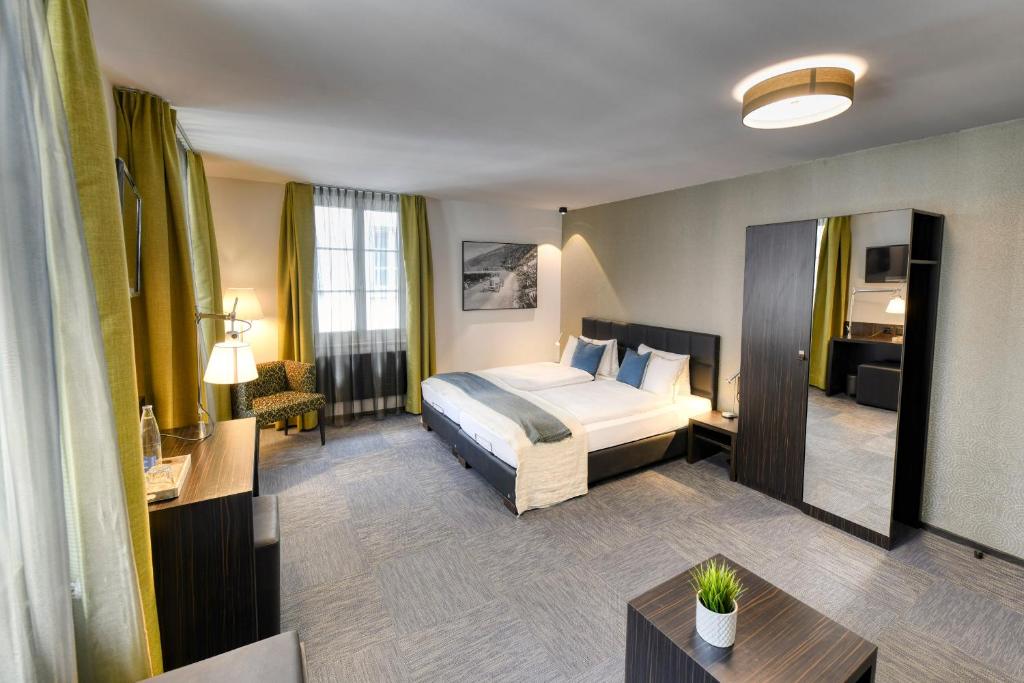 Postel nebo postele na pokoji v ubytování Boutique Hotel Reiser