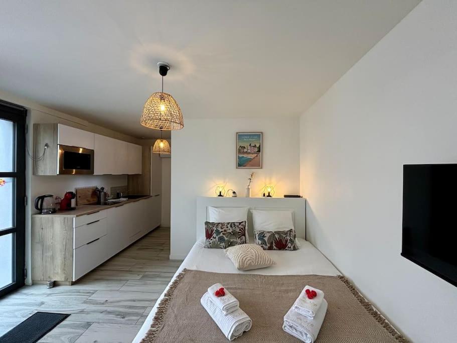 Kuchyň nebo kuchyňský kout v ubytování Le charmant studio n 32B à 350m des plages