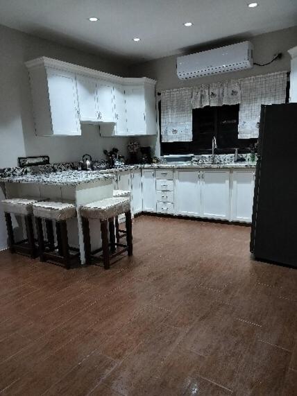 Kuchyň nebo kuchyňský kout v ubytování urban oasis