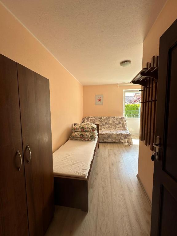Posteľ alebo postele v izbe v ubytovaní Noce i dnie