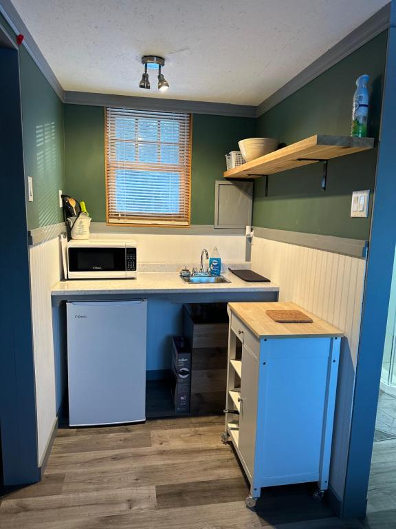 Kuchyň nebo kuchyňský kout v ubytování Cozy cabin