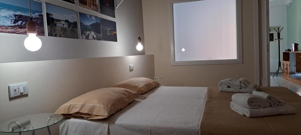 Postel nebo postele na pokoji v ubytování Casa Vacanze CHome