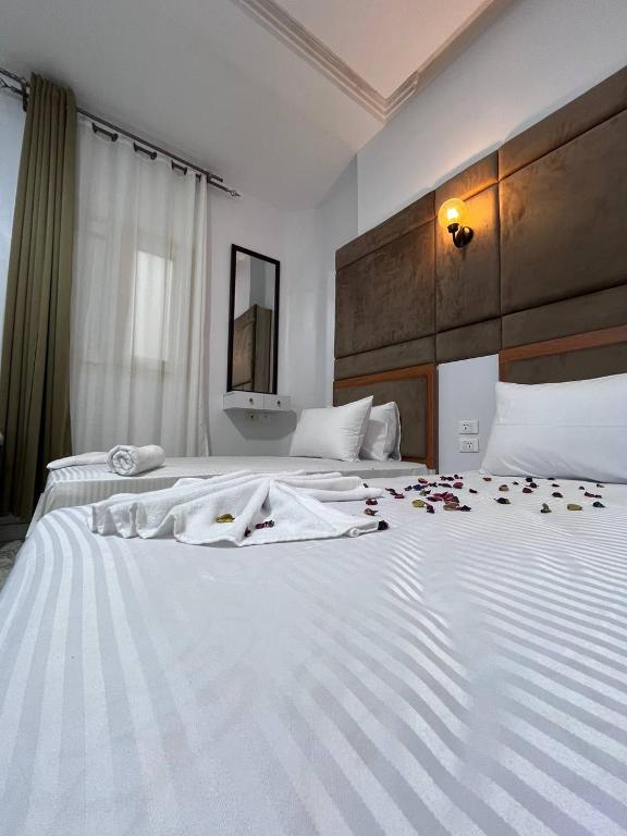 Postel nebo postele na pokoji v ubytování Future Hostel