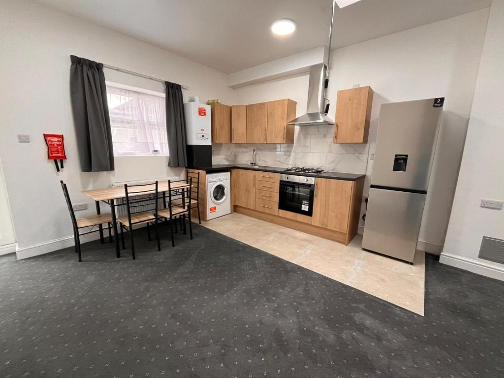 Η κουζίνα ή μικρή κουζίνα στο L&C Apartments