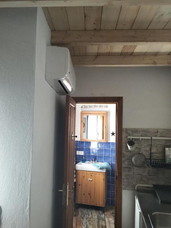 Kuchyňa alebo kuchynka v ubytovaní Casa pescado, madera y sol