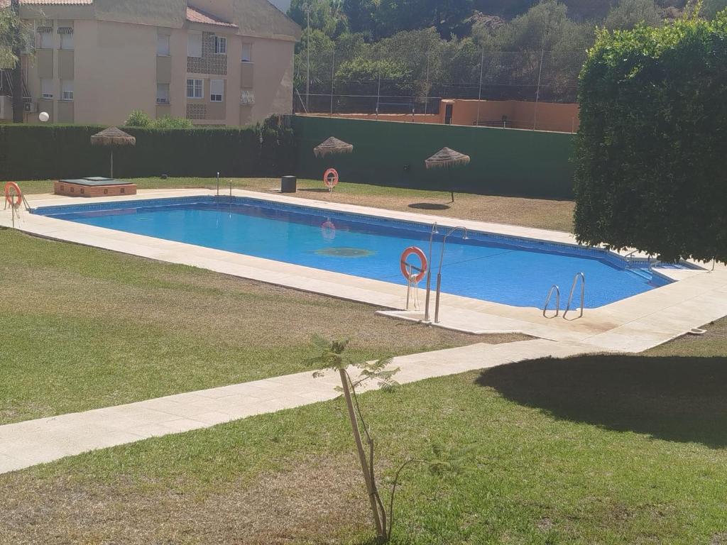 Bazén v ubytování Habitación privada en Rincón nebo v jeho okolí