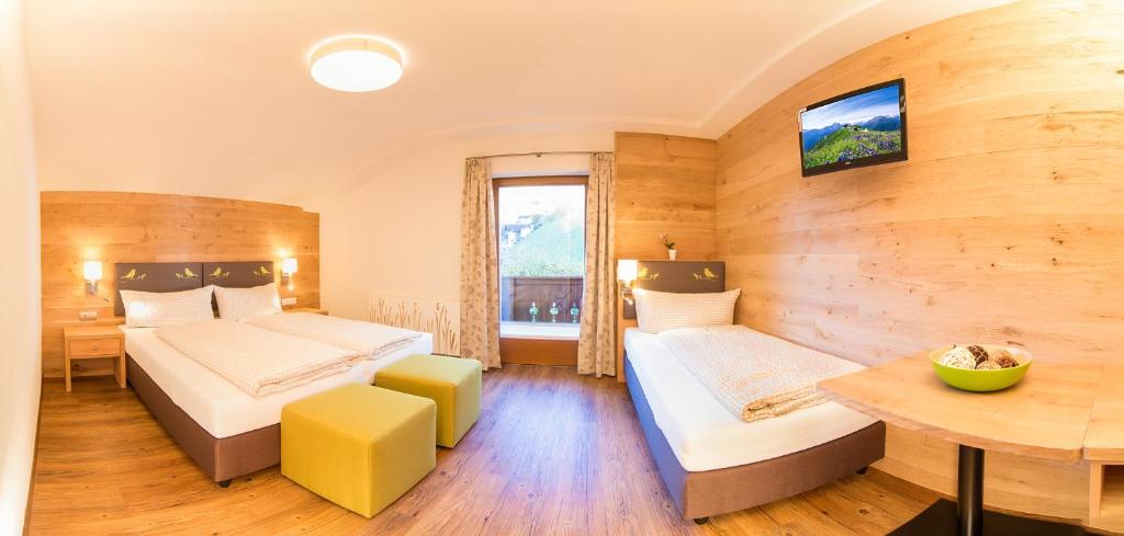 Postel nebo postele na pokoji v ubytování Pension Sonnleitn