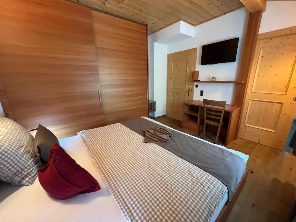 Postel nebo postele na pokoji v ubytování Gasthaus Bad Siess