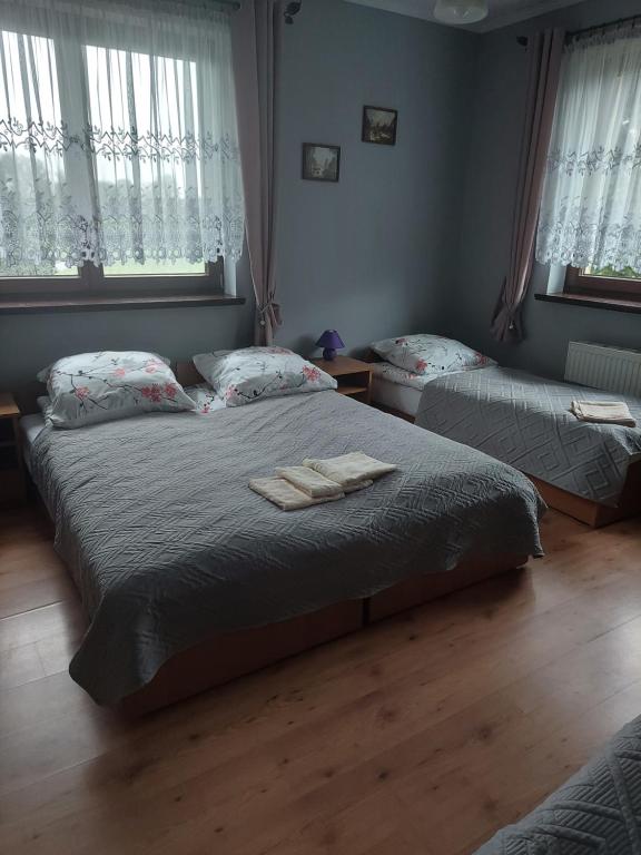 Posteľ alebo postele v izbe v ubytovaní Agroturystyka Zielony Ogród