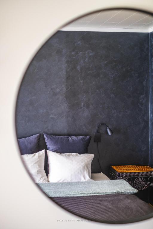 Postel nebo postele na pokoji v ubytování Pinska Guesthouse