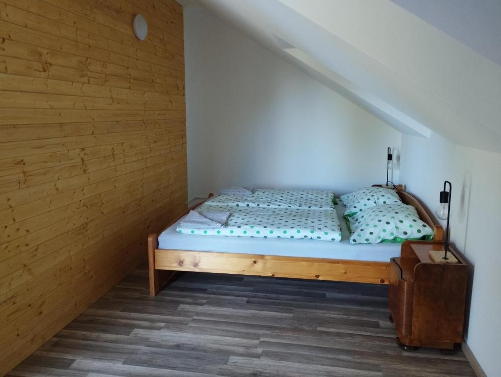 Postel nebo postele na pokoji v ubytování Apartmány Svatá
