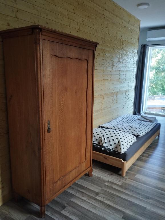Postel nebo postele na pokoji v ubytování Apartmány Svatá