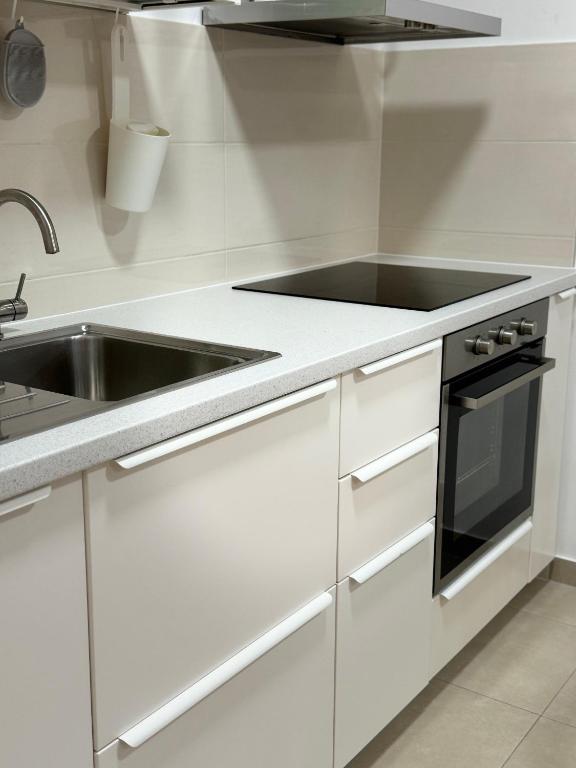 Kuchyňa alebo kuchynka v ubytovaní Apartment Allora