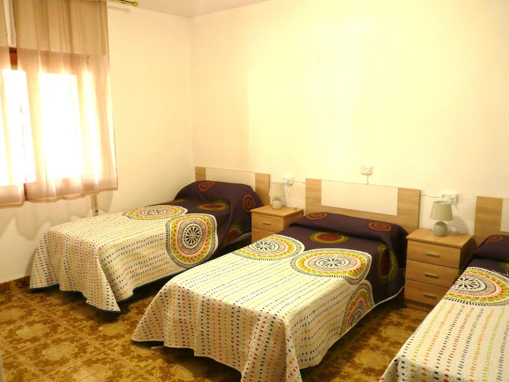 Posteľ alebo postele v izbe v ubytovaní CASA INOCENCIA