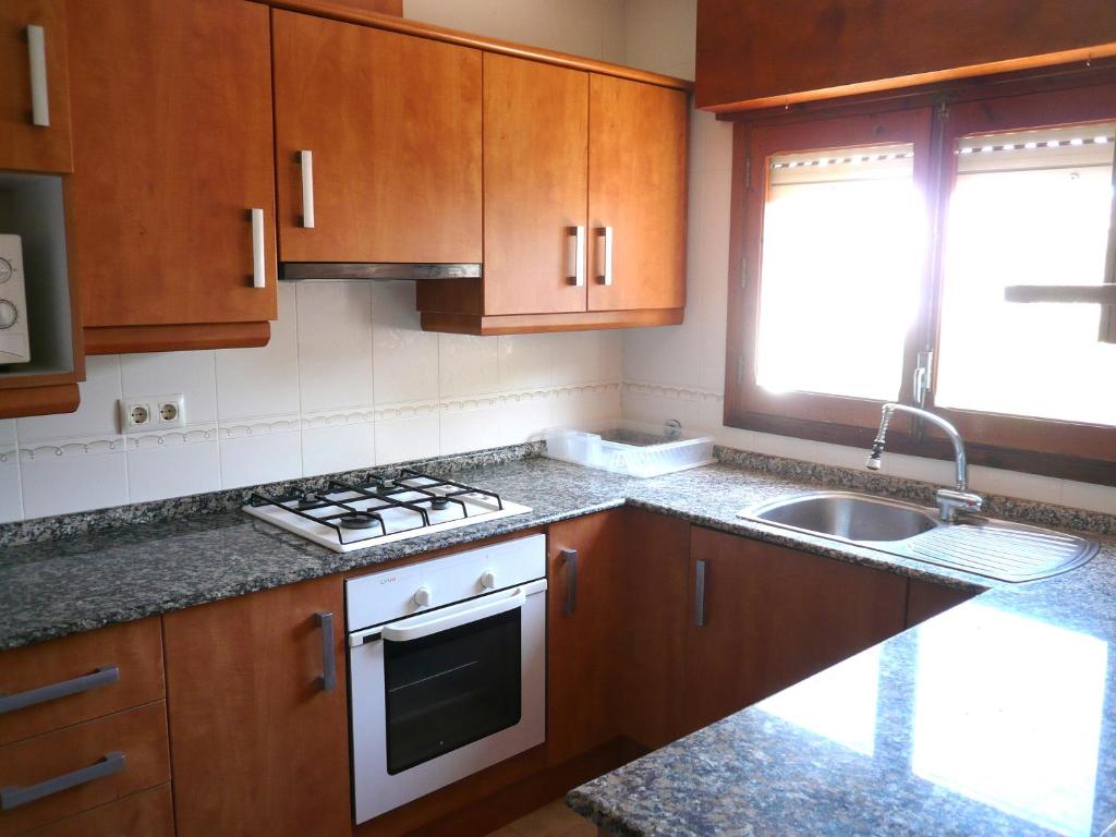 Kuchyňa alebo kuchynka v ubytovaní CASA INOCENCIA