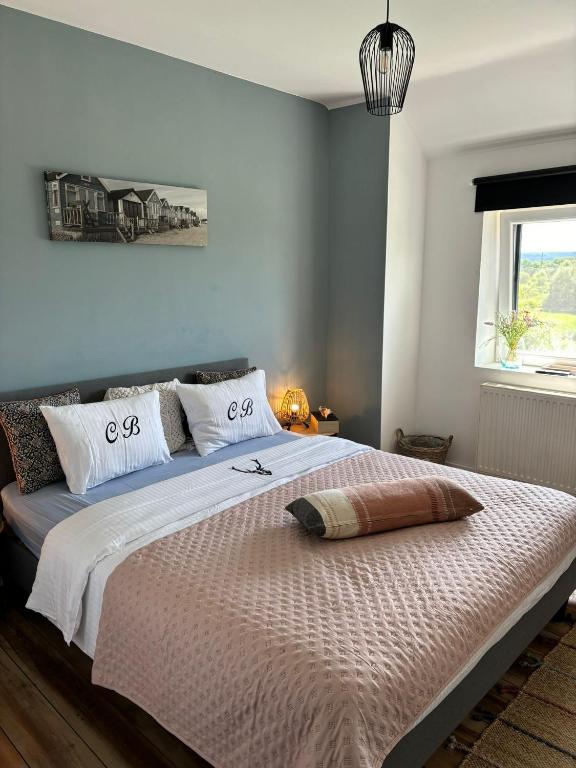 Postel nebo postele na pokoji v ubytování Le Clos Des Bansions