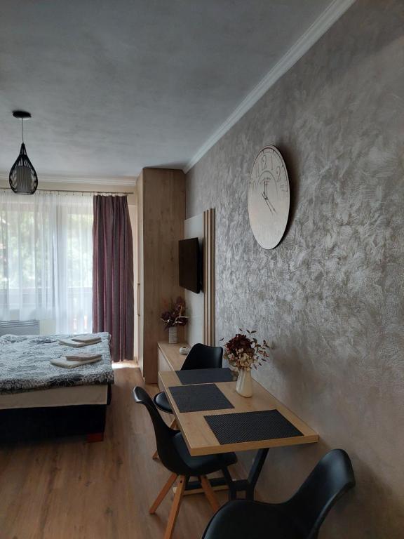 A bed or beds in a room at Apartments 17 - 23 AD Kamzík