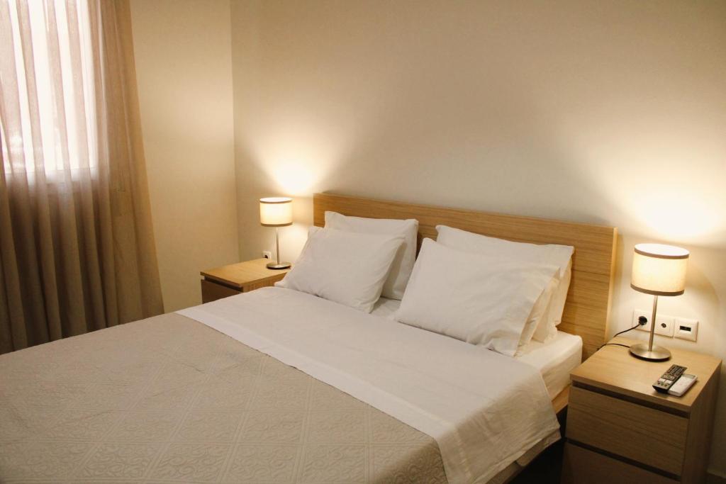 Postel nebo postele na pokoji v ubytování G&G Apartment
