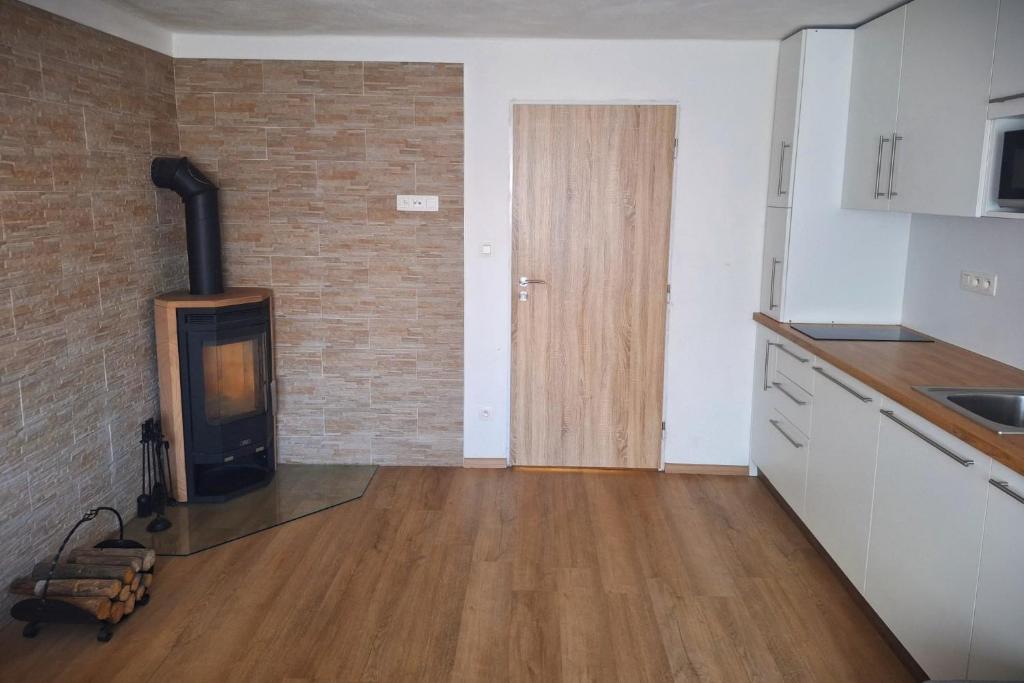Kuchyň nebo kuchyňský kout v ubytování Apartmány Šafran Štrba