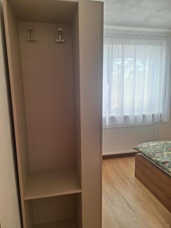 Postel nebo postele na pokoji v ubytování Apartmány Šafran Štrba