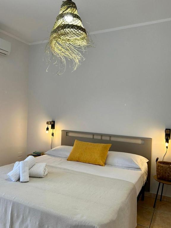 Postel nebo postele na pokoji v ubytování VitaLenta Rooms