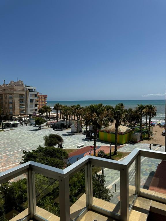 a view of the beach from the balcony at Torrevieja - LaMata - Sonny in La Mata
