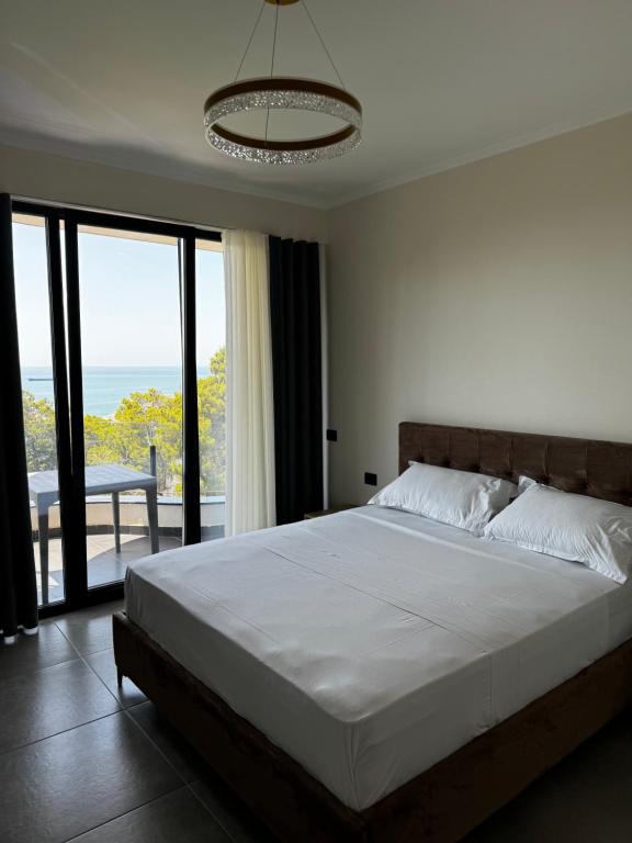 Postel nebo postele na pokoji v ubytování Marku apartament