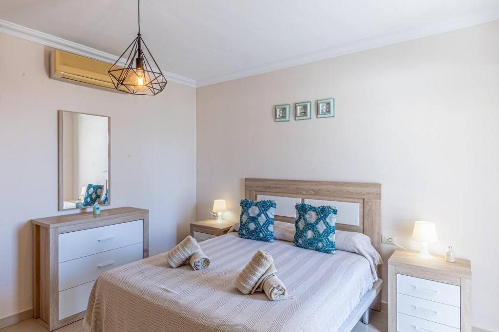 Postel nebo postele na pokoji v ubytování La Perla Playa Apt Dream Homes Tenerife