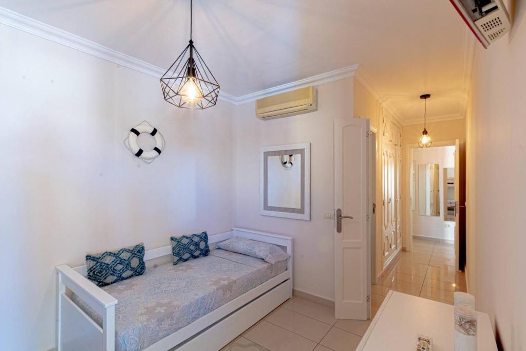 Postel nebo postele na pokoji v ubytování La Perla Playa Apt Dream Homes Tenerife