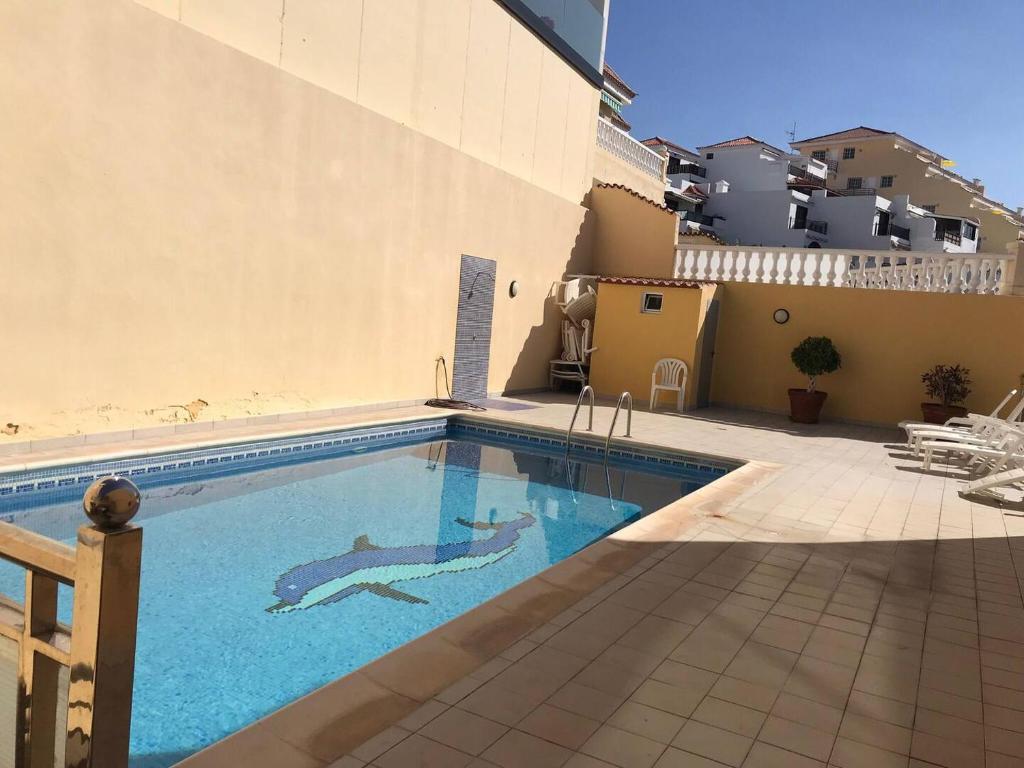 Bazén v ubytování La Perla Playa Apt Dream Homes Tenerife nebo v jeho okolí