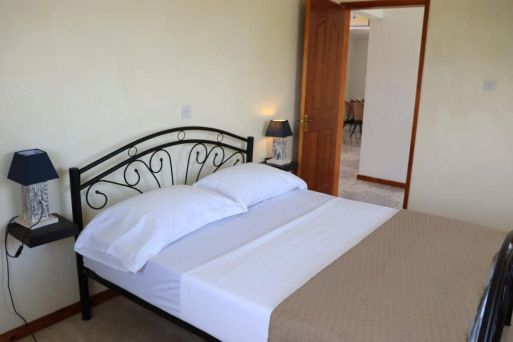 Postel nebo postele na pokoji v ubytování Panoramic Seaview suite
